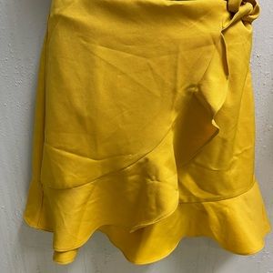 Yellow skirt.